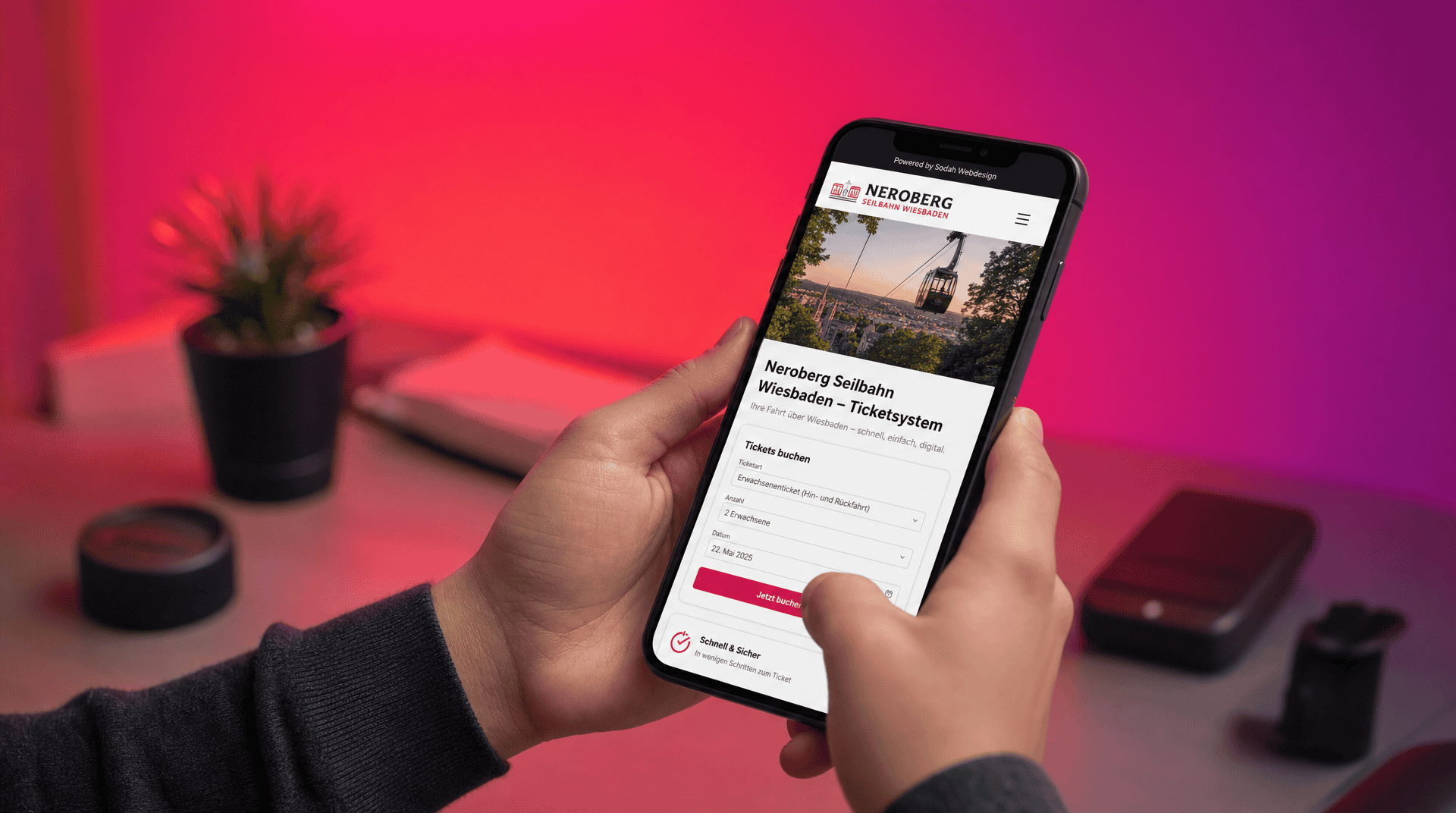 Nerobergbahn Wiesbaden Ticketbuchung per Smartphone Person bucht Tickets für die Nerobergbahn Wiesbaden über ein Smartphone-App.